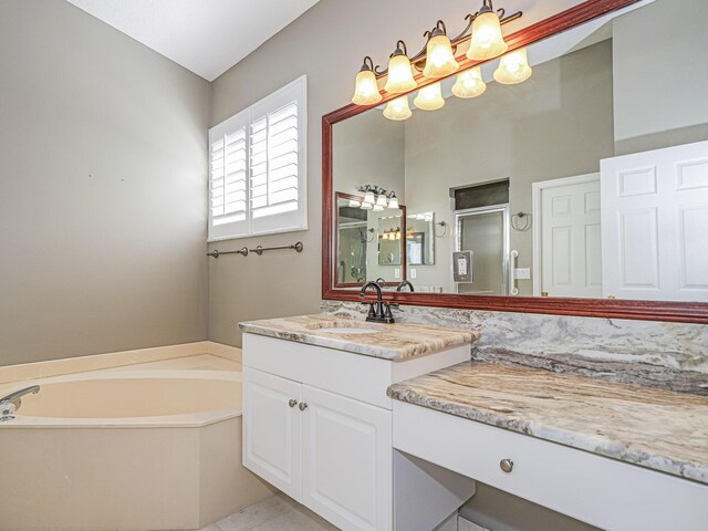 bathroom with vanity, tile patterned floors, and independent shower and bath