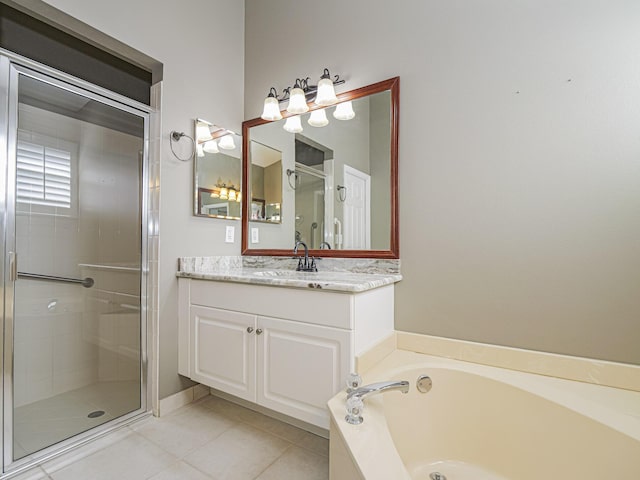 bathroom featuring separate shower and tub, tile patterned flooring, and vanity