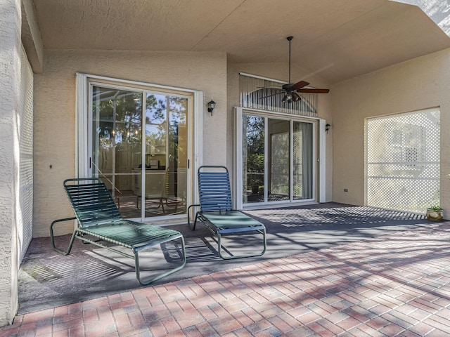 view of patio with ceiling fan