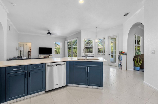 kitchen featuring dishwasher, blue cabinets, sink, ceiling fan, and light tile patterned floors