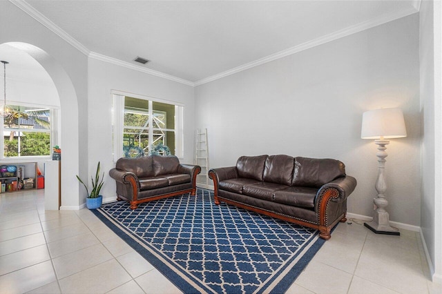 living room featuring tile patterned flooring and ornamental molding