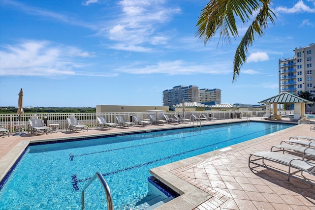 view of pool with a gazebo and a patio