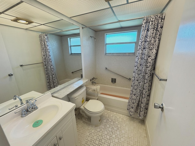 full bathroom with vanity, toilet, and shower / bath combo with shower curtain