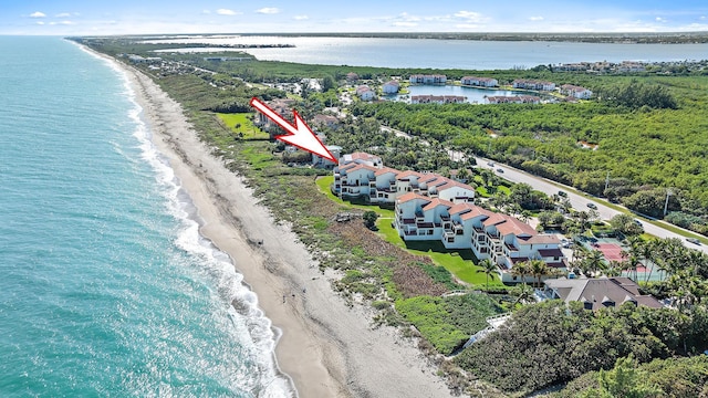 aerial view with a view of the beach and a water view