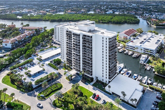 birds eye view of property featuring a water view