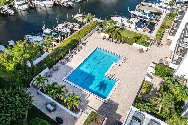 birds eye view of property featuring a water view