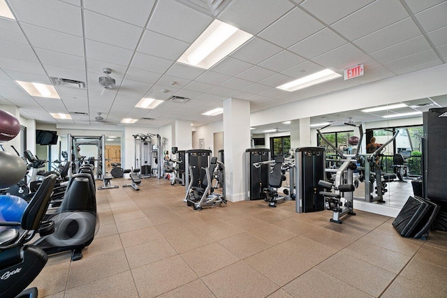 workout area with a drop ceiling