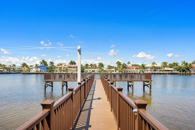 dock area featuring a water view