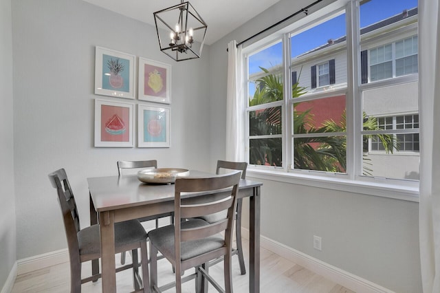 dining room with a notable chandelier