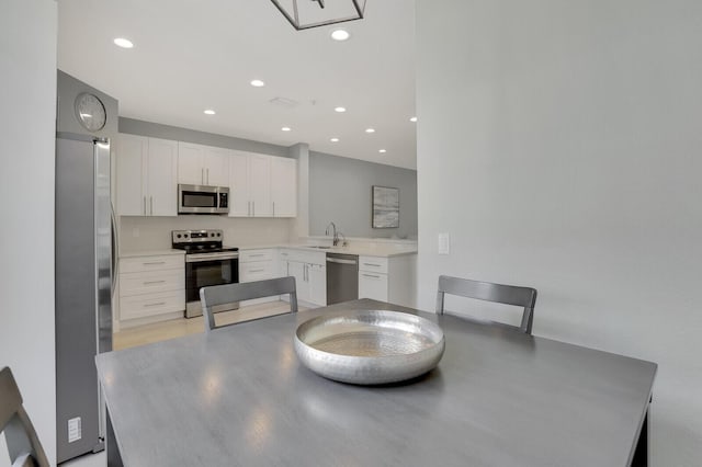 dining space with sink