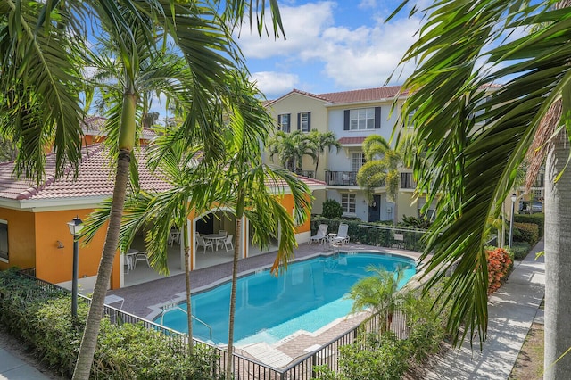 view of pool featuring a patio