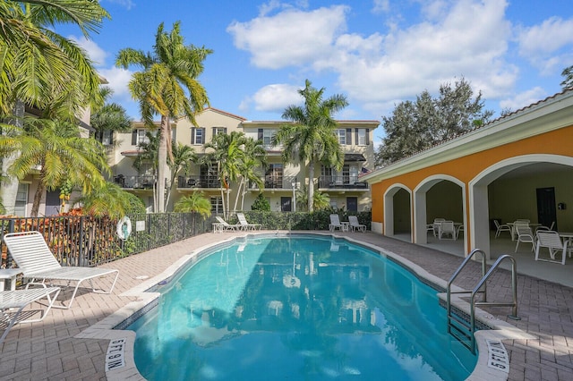 view of pool featuring a patio