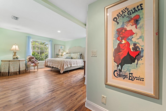 bedroom featuring hardwood / wood-style floors