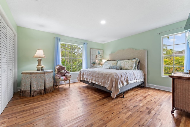 bedroom featuring light wood-type flooring