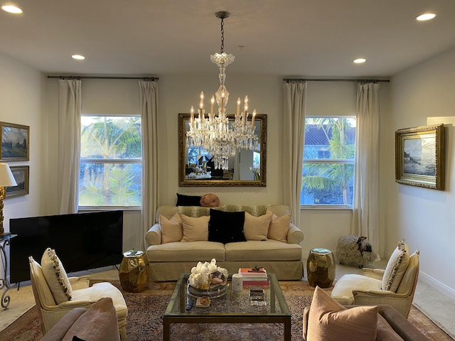 living room featuring a notable chandelier