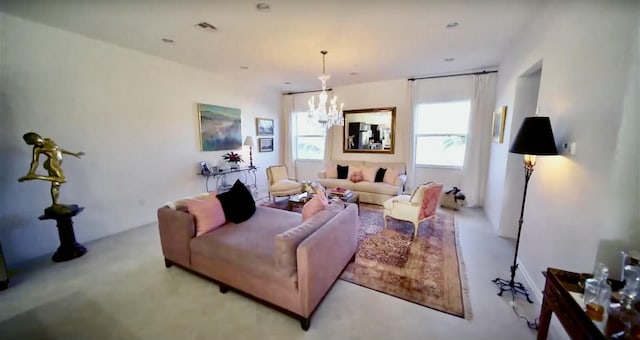 living room featuring a notable chandelier