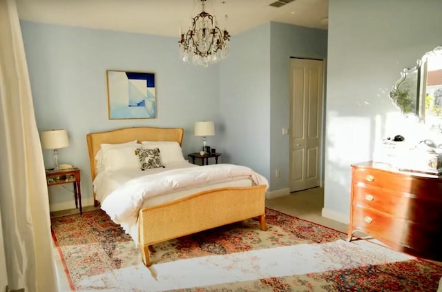 bedroom with a chandelier