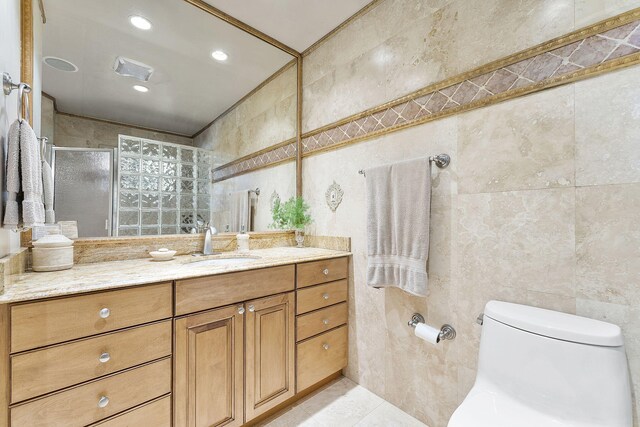 tiled home office featuring ceiling fan and a textured ceiling