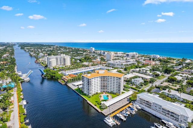 drone / aerial view with a water view