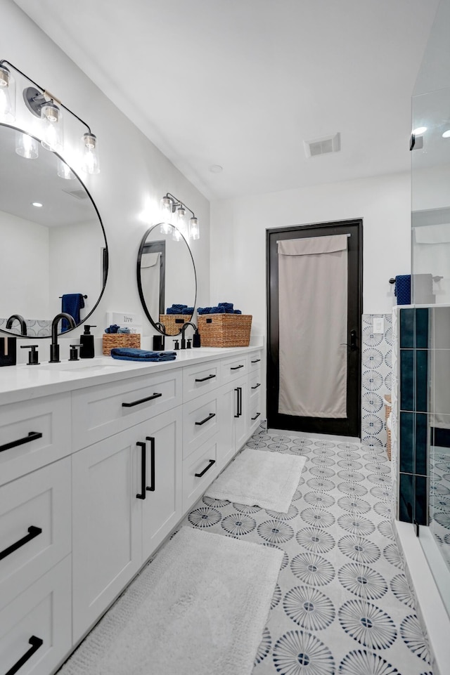 bathroom featuring vanity and tile patterned floors