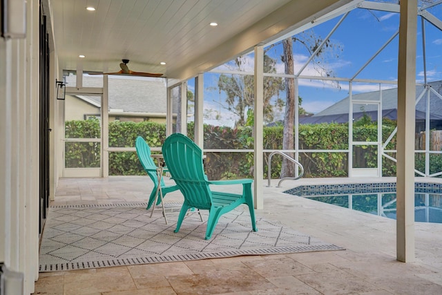 unfurnished sunroom with a pool and wood ceiling