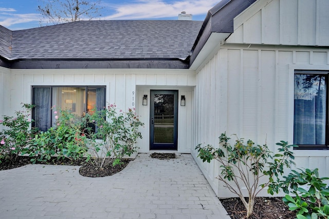 doorway to property with a patio