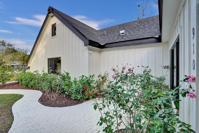 view of property exterior with a patio area