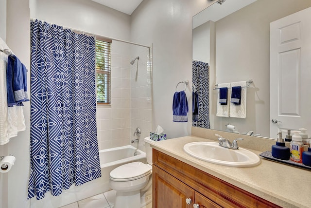 full bathroom with vanity, shower / tub combo, tile patterned floors, and toilet