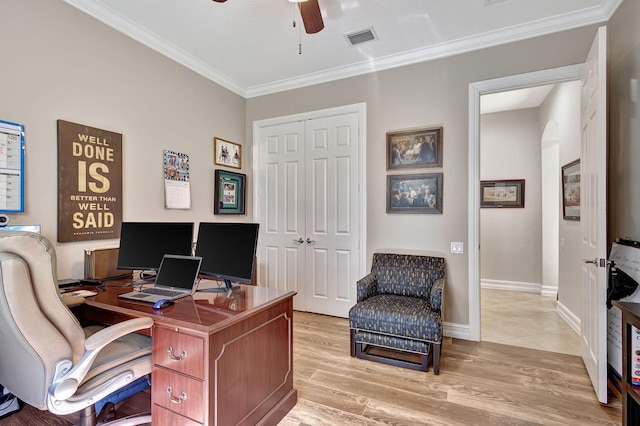 home office featuring wood-type flooring, ornamental molding, and ceiling fan