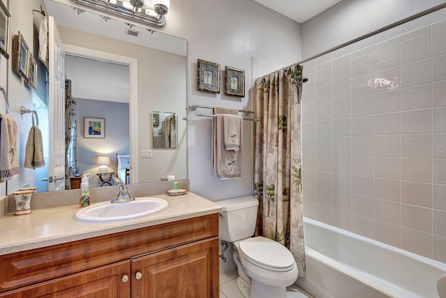 full bathroom with shower / bath combination with curtain, tile patterned floors, vanity, and toilet