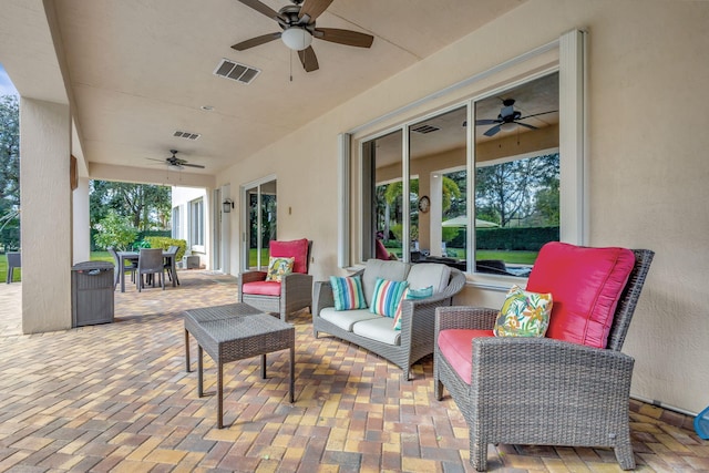 view of patio / terrace featuring outdoor lounge area and ceiling fan