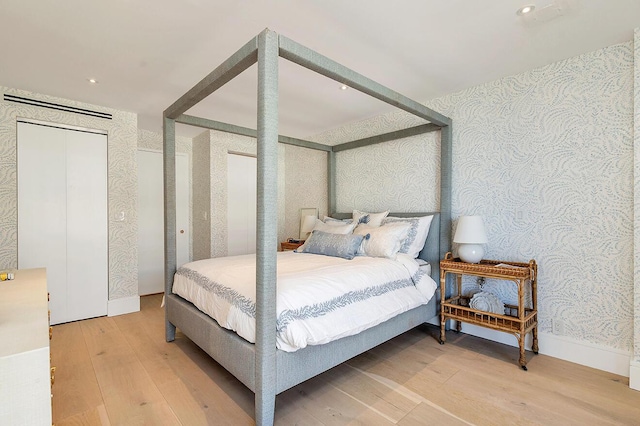 bedroom with light wood-type flooring