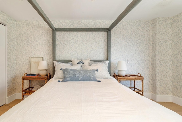 bedroom featuring wood-type flooring