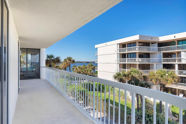 balcony featuring a water view