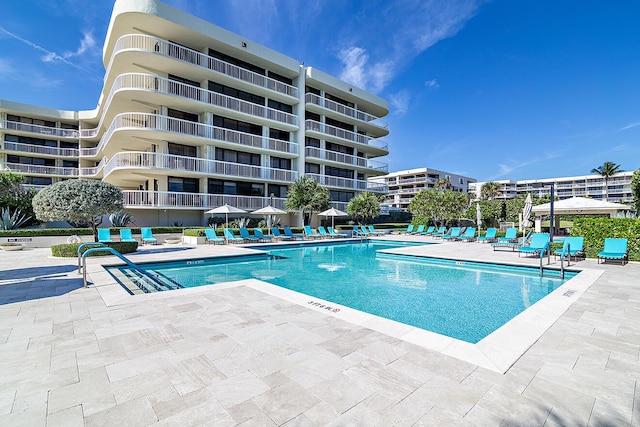 view of swimming pool featuring a patio