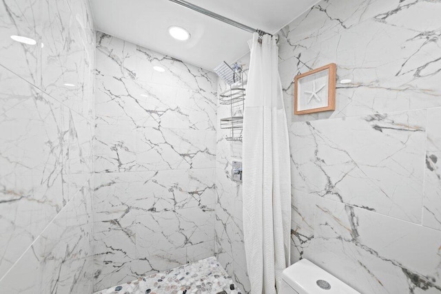 5219 NE 20th Ter, Pompano Beach, FL 33064 - full bath with a marble finish shower and recessed lighting