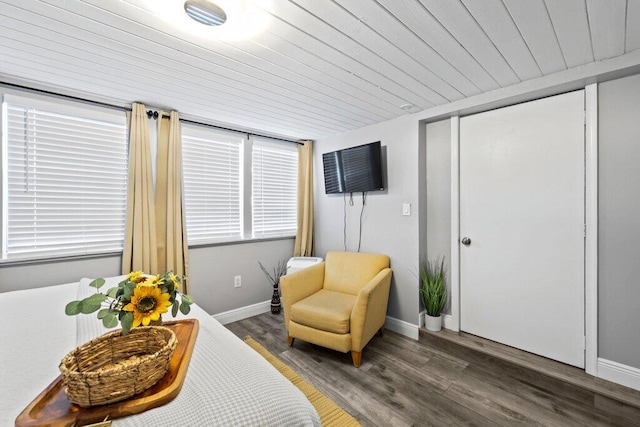 5219 NE 20th Ter, Pompano Beach, FL 33064 - sitting room featuring baseboards, wood finished floors, and wooden ceiling