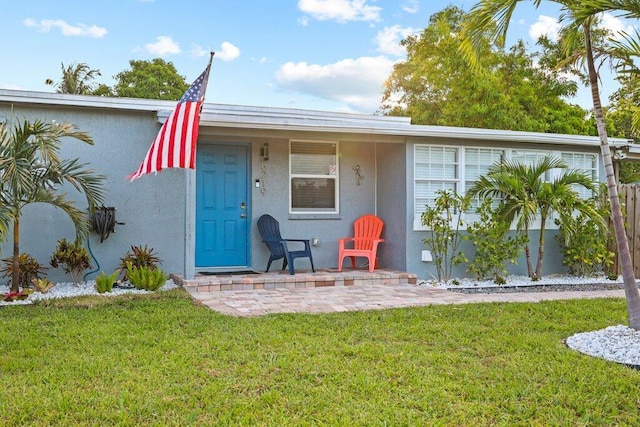 exterior space with a yard