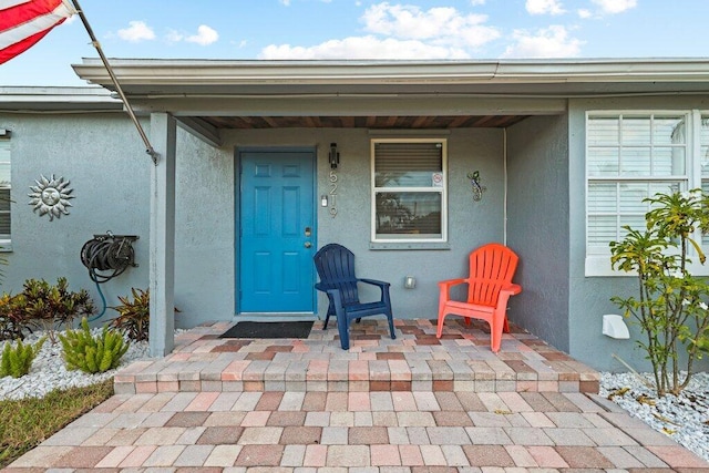 5219 NE 20th Ter, Pompano Beach, FL 33064 - property entrance featuring stucco siding and covered porch