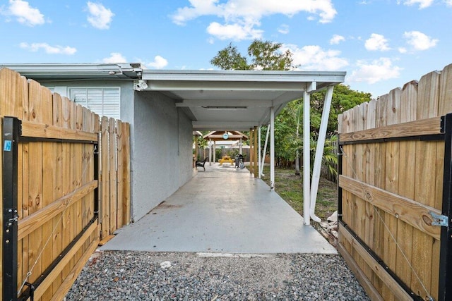 5219 NE 20th Ter, Pompano Beach, FL 33064 - view of parking featuring a fenced backyard