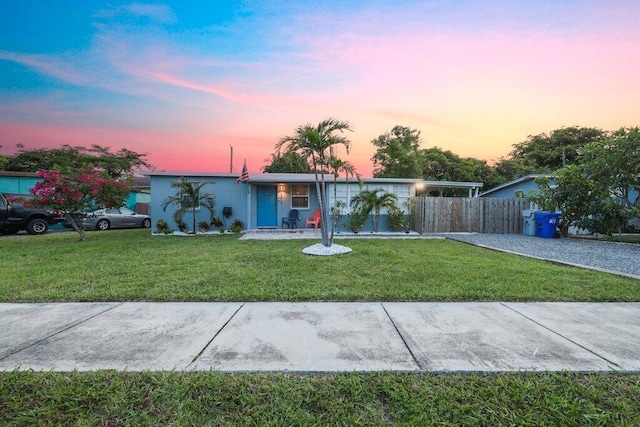 view of front of home featuring a yard