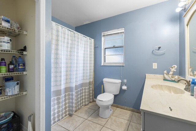 carpeted bedroom featuring a textured ceiling, ceiling fan, and ensuite bathroom