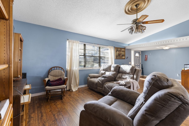 living room featuring ceiling fan, dark wood-type flooring, a textured ceiling, and lofted ceiling