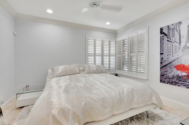 bedroom featuring ceiling fan and ornamental molding