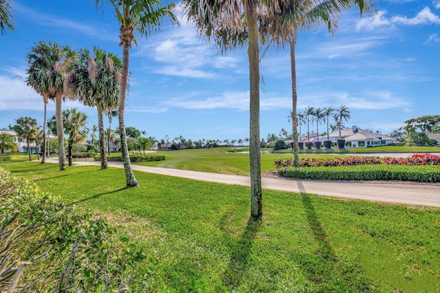 surrounding community featuring a lawn