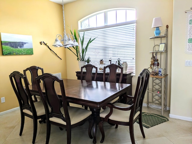 dining room with a notable chandelier