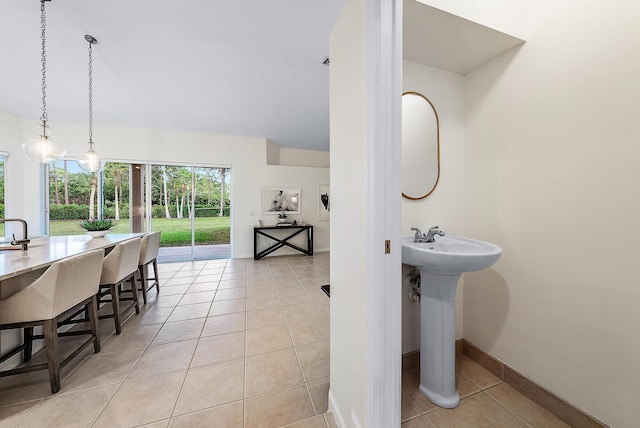 dining space with light tile patterned floors