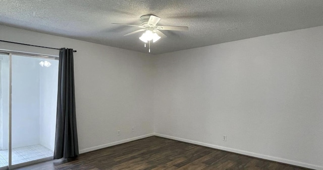 unfurnished room featuring dark hardwood / wood-style floors and ceiling fan