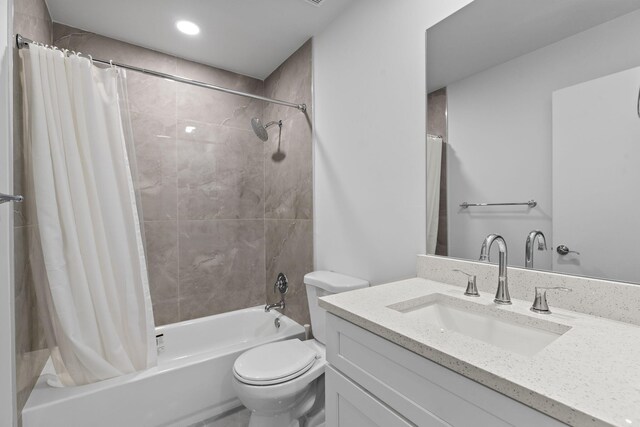 bathroom featuring a shower with curtain, vanity, tile walls, and toilet