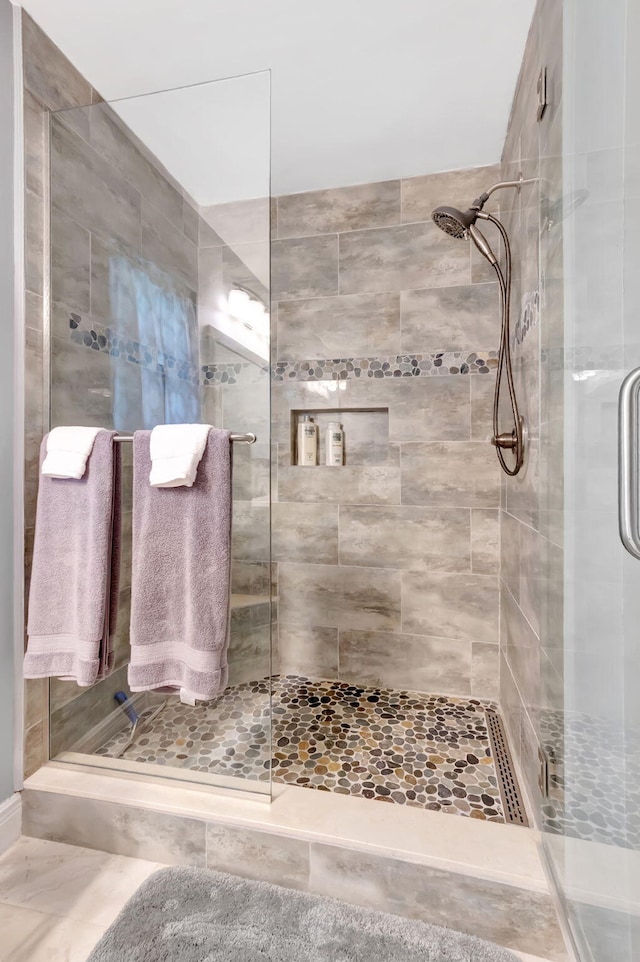 bathroom with a stall shower